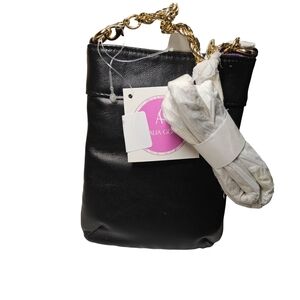 Amalia Gomez black flip back with inside purple lining